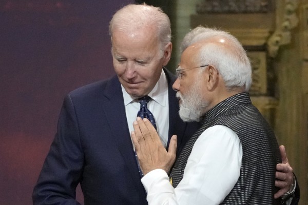 US President Joe Biden and India Prime Minister Narendra Modi talk during the 2022 G20 leaders summit in Bali, Indonesia. Photo: AP