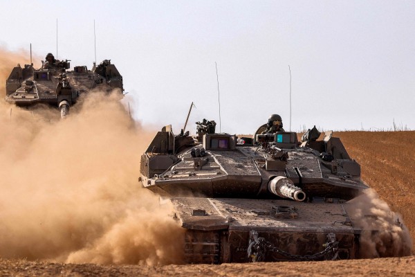Israeli army battle tanks move near the border with the Gaza Strip. Photo: AFP