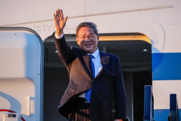 China’s Premier Li Qiang waves as he arrives at Adelaide Airport. Photo: AFP China’s Premier Li Qiang waves as he arrives at Adelaide Airport. Photo: AFP
