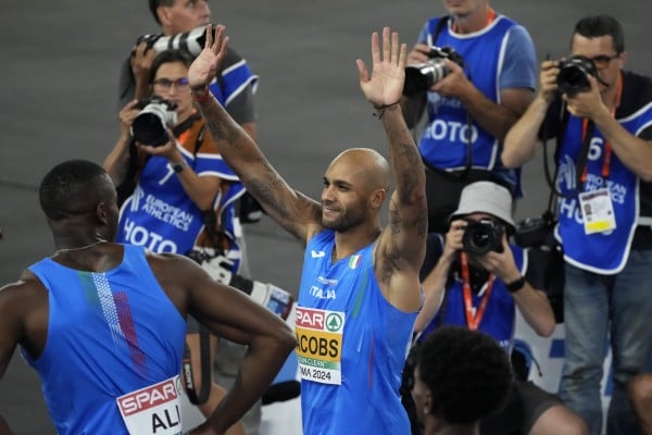 Marcell Jacobs of Italy celebrates after clocking his fastest time since the Tokyo Olympics to win the European 100 metre title in Rome in June. Photo: AP Marcell Jacobs of Italy celebrates after clocking his fastest time since the Tokyo Olympics to win the European 100 metre title in Rome in June. Photo: AP