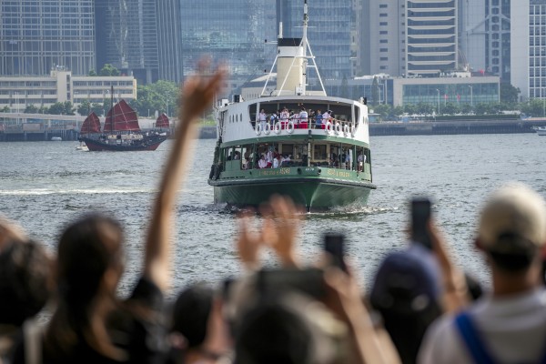 A short voyage on a Star Ferry vessel was among Friday’s  activities for the mainland Olympians. Photo: Sam Tsang