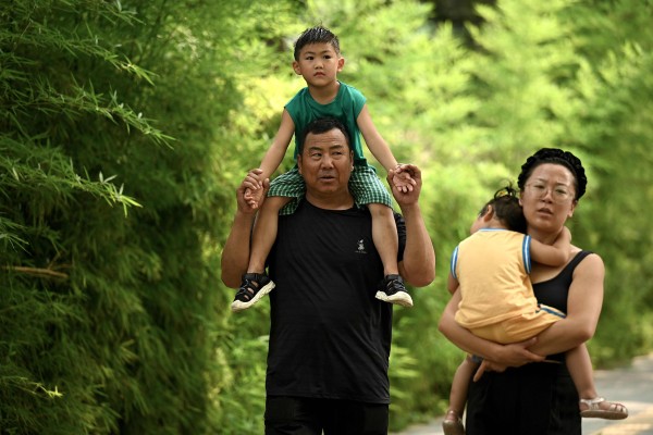 A professor at Renmin University has asked a visiting Kazakh politician how China could “obediently, submissively have children, have children early and have lots of children”. Photo: AFP