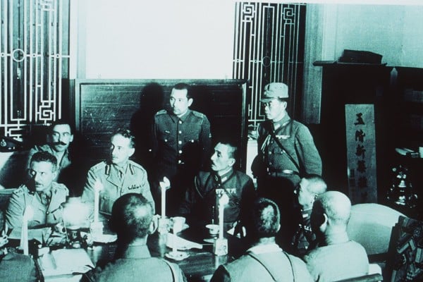 The British surrender Hong Kong to the Japanese on Christmas Day in 1941. Photo: SCMP Archives The British surrender Hong Kong to the Japanese on Christmas Day in 1941. Photo: SCMP Archives