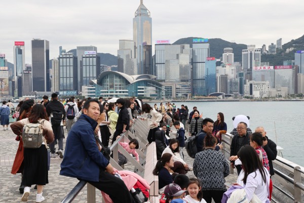 Tourists visit the Tsim Sha Tsui waterfront during Lunar New Year. Photo: Jelly Tse