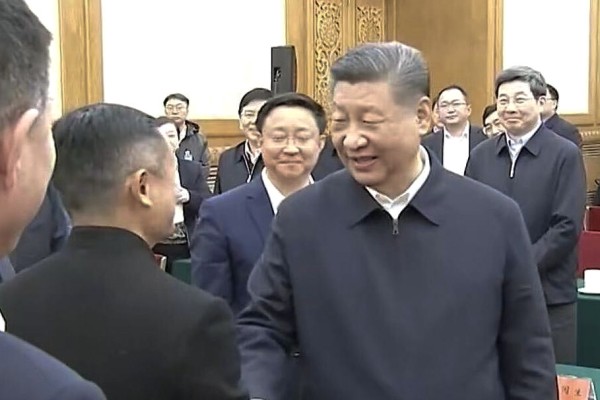 President Xi Jinping shakes hands with Alibaba founder Jack Ma at a meeting with China’s private-sector leaders. Alibaba owns the South China Morning Post. Photo: CCTV