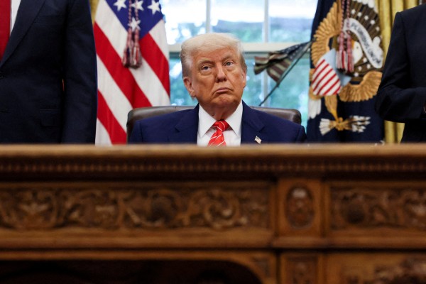 US President Donald Trump announces a trade deal with Britain in the Oval Office of the White House in Washington on Thursday. Photo: Reuters