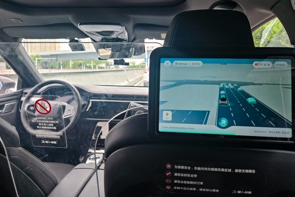 An Apollo Go robotaxi navigates the road in Wuhan, Hubei province, in July last year. Photo: Coco Feng