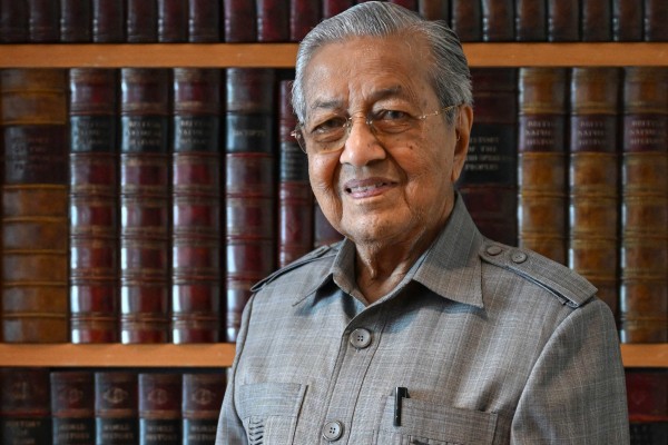 Malaysia’s former prime minister Mahathir Mohamad poses for a picture at his office in Putrajaya. Photo: AFP