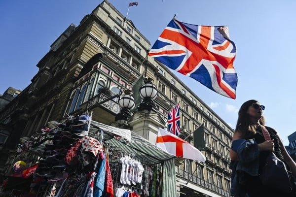 The UK has not clarified whether Hong Kong’s BN(O) passport holders who have migrated or plan to move to the Britain under a bespoke scheme will be affected by new migration curbs. Photo: Getty Images The UK has not clarified whether Hong Kong’s BN(O) passport holders who have migrated or plan to move to the Britain under a bespoke scheme will be affected by new migration curbs. Photo: Getty Images