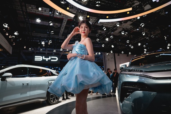 A model poses at the booth of Chinese carmaker BYD at last month’s Auto Shanghai show. Photo: EPA-EFE