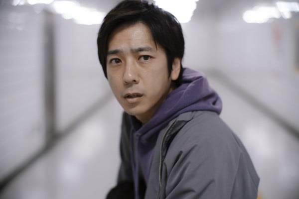 Kazunari Ninomiya, a popular Japanese singer-songwriter, actor and member of J-pop group Arashi, in a still from Exit 8. Kazunari Ninomiya, a popular Japanese singer-songwriter, actor and member of J-pop group Arashi, in a still from Exit 8.
