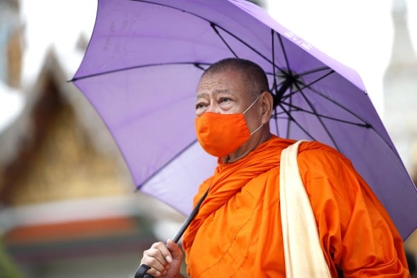 A monk wears a face mask in Bangkok. Thai health authorities this month urged the public to remain cautious after a significant surge of Covid-19 cases. Photo: EPA-EFE A monk wears a face mask in Bangkok. Thai health authorities this month urged the public to remain cautious after a significant surge of Covid-19 cases. Photo: EPA-EFE