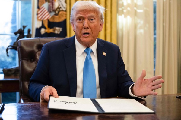 US President Donald Trump speaks to the press after signing an executive order withdrawing his country from a number of United Nations bodies on February 4. Photo: AFP