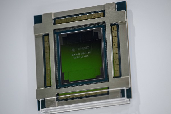 An Nvidia chip is displayed at its booth during the China International Supply Chain Expo in Beijing on July 16, 2025. Photo: AFP