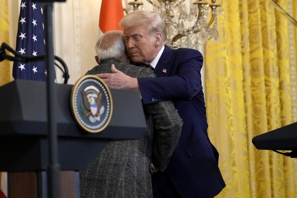 US President Donald Trump, right, hugs Indian Prime Minister Narendra Modi during a White House news conference in February. Photo: AP