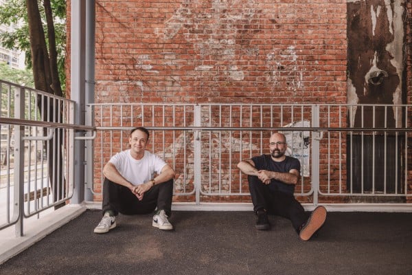Ghost Signs co-founders Billy Potts (left) and Ben Marans at the bridge near the old Mayar Silk Mills (HK) factory in Tsuen Wan. Photo: Jocelyn Tam Ghost Signs co-founders Billy Potts (left) and Ben Marans at the bridge near the old Mayar Silk Mills (HK) factory in Tsuen Wan. Photo: Jocelyn Tam
