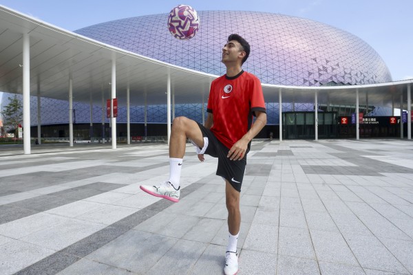 Hong Kong football influencer Jeh Vas shows off his skills in front of Kai Tak Stadium. Photo: Jonathan Wong