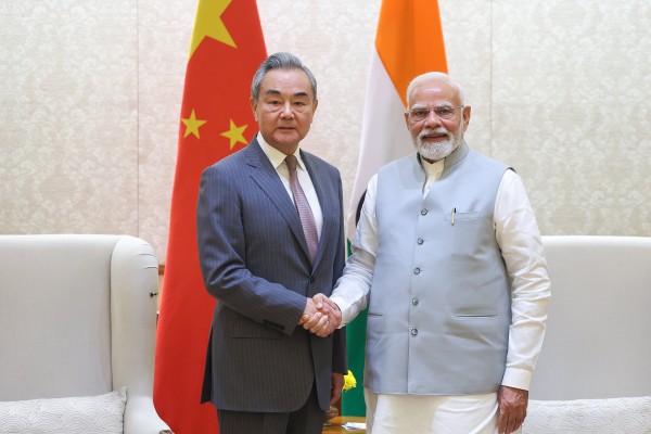Foreign Minister Wang Yi is greeted by Indian Prime Minister Narendra Modi in New Delhi on August 19. Photo: EPA