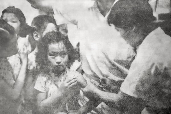 A girl receives an anti-cholera injection at a government clinic in Hong Kong, in 1961. Photo: SCMP Archives A girl receives an anti-cholera injection at a government clinic in Hong Kong, in 1961. Photo: SCMP Archives