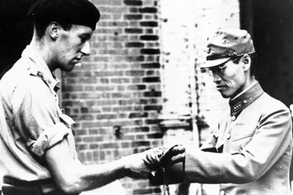 Captain R.J. McGaral RM, of HMS Venerable, the fleet aircraft carrier that took part in the reoccupation of Hong Kong, checks over surrendered arms at Whitfield Camp, Kowloon, where Japanese soldiers were interned, in September 1945. Photo: British Forces Captain R.J. McGaral RM, of HMS Venerable, the fleet aircraft carrier that took part in the reoccupation of Hong Kong, checks over surrendered arms at Whitfield Camp, Kowloon, where Japanese soldiers were interned, in September 1945. Photo: British Forces
