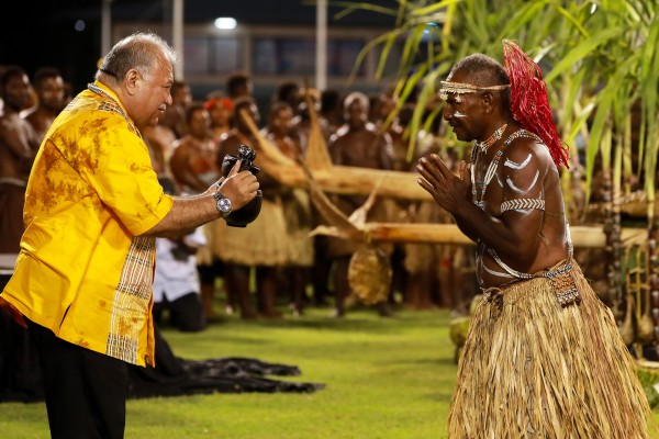 Pacific Islands Forum Secretary-General Baron Waqa receives a gift from a Solomon Islander during the opening ceremony on Monday. Photo: Xinhua