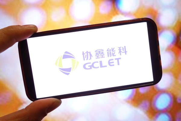 POLAND - 2025/03/18: In this photo illustration, the GCL Energy Technology company logo is seen displayed on a smartphone screen. (Photo Illustration by Piotr Swat/SOPA Images/LightRocket via Getty Images) POLAND - 2025/03/18: In this photo illustration, the GCL Energy Technology company logo is seen displayed on a smartphone screen. (Photo Illustration by Piotr Swat/SOPA Images/LightRocket via Getty Images)