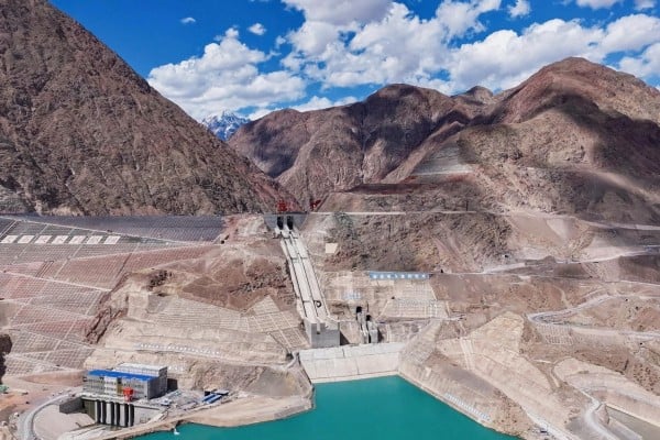 The Dashixia mega dam in Xinjiang is 247 metres high – about the same as an 80-storey building. Photo: CCTV The Dashixia mega dam in Xinjiang is 247 metres high – about the same as an 80-storey building. Photo: CCTV