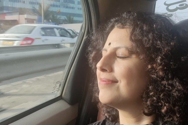 Pathak, with a new mane of curlier hair, exhales on her way to a writing retreat in Bangalore months after her treatment for breast cancer ended in 2023. Photo: Aarti Pathak