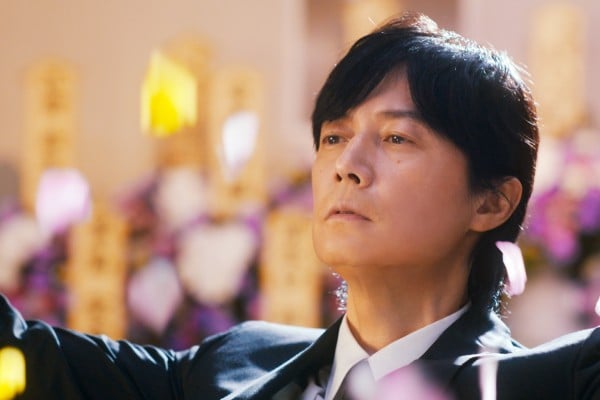 Masaharu Fukuyama in a still from Black Showman (category: IIA, Japanese), co-starring Kasumi Arimura and directed by Ryo Tanaka. Masaharu Fukuyama in a still from Black Showman (category: IIA, Japanese), co-starring Kasumi Arimura and directed by Ryo Tanaka.