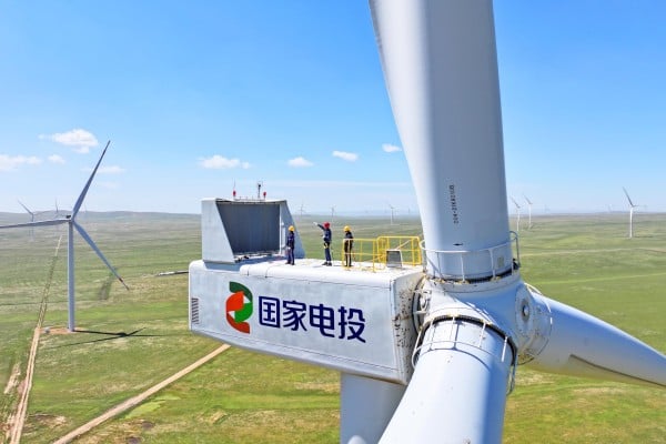 Workers conduct maintenance operations on wind turbines in China’s Inner Mongolia Autonomous Region. Photo: Getty Images Workers conduct maintenance operations on wind turbines in China’s Inner Mongolia Autonomous Region. Photo: Getty Images