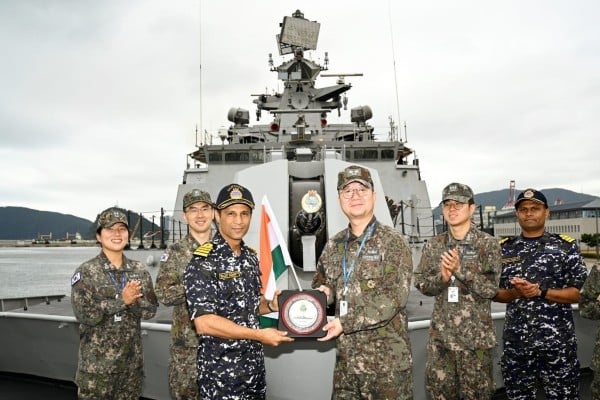 Indian and South Korean navy officers pose aboard the Sahyadri during their first-ever bilateral naval exercise, in Busan on October 13. Photo: Handout Indian and South Korean navy officers pose aboard the Sahyadri during their first-ever bilateral naval exercise, in Busan on October 13. Photo: Handout