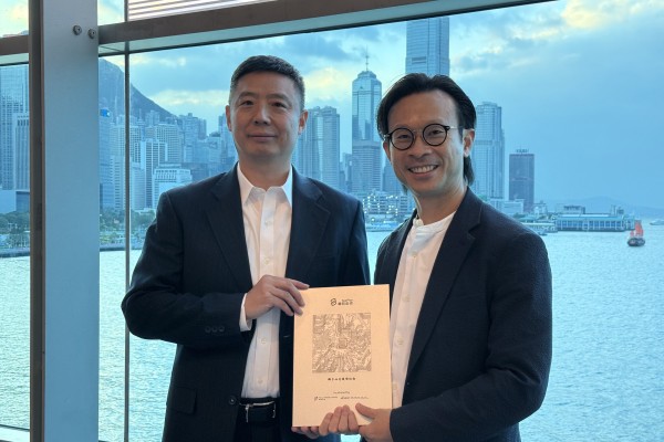 StarFive founder and CEO Thomas Xu (left) and Full Vision Capital managing partner Alan Chan hold a Lion Rock RISC-V chip in Hong Kong on November 14, 2025. Photo: Xinmei Shen
