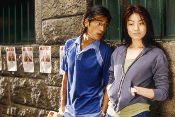Takeshi Kaneshiro (left) and Kelly Chen in a still from quirky Hong Kong romance Anna Magdalena (1998), directed by Yee Chung-man. 