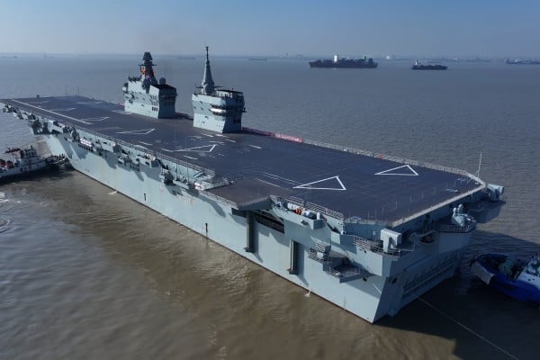 China’s first drone-carrying Type 076 amphibious assault ship, the Sichuan, on its maiden sea trial on Friday. Photo: Xinhua China’s first drone-carrying Type 076 amphibious assault ship, the Sichuan, on its maiden sea trial on Friday. Photo: Xinhua