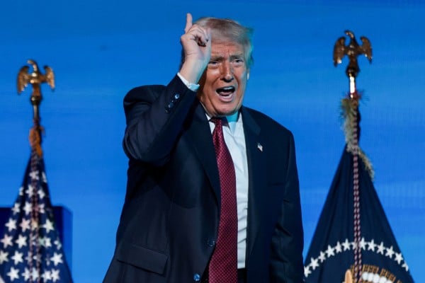 US President Donald Trump gestures during the American Business Forum Miami at the Kaseya Centre Arena in Miami, Florida, US, on November 5. Photo: Reuters US President Donald Trump gestures during the American Business Forum Miami at the Kaseya Centre Arena in Miami, Florida, US, on November 5. Photo: Reuters