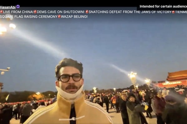 American political commentator and live-streamer Hasan Piker was stopped by a police officer while waiting to watch the daily sunset flag-raising ceremony in Tiananmen Square. Photo: Screenshot from Twitch American political commentator and live-streamer Hasan Piker was stopped by a police officer while waiting to watch the daily sunset flag-raising ceremony in Tiananmen Square. Photo: Screenshot from Twitch