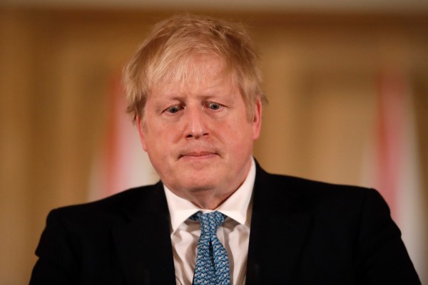 Then UK Prime Minister Boris Johnson gives a news conference about the ongoing situation with the coronavirus outbreak inside 10 Downing Street in London in 2020. Photo: AP