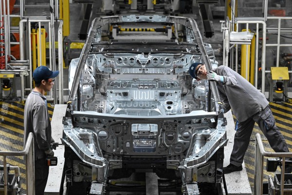 Employees work on an electric vehicle production line at a factory of Chinese automaker NIO in Hefei, in eastern China’s Anhui province on September 24, 2025. Photo: AFP Employees work on an electric vehicle production line at a factory of Chinese automaker NIO in Hefei, in eastern China’s Anhui province on September 24, 2025. Photo: AFP