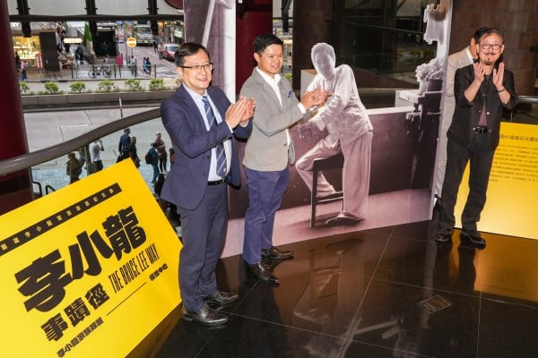 Bruce Lee’s younger brother Robert, right, was in attendance as plans for a new monument, extending the memorial trail, were unveiled at the Prudential Centre in Tsim Sha Tsui. Photo: Eugene Lee Bruce Lee’s younger brother Robert, right, was in attendance as plans for a new monument, extending the memorial trail, were unveiled at the Prudential Centre in Tsim Sha Tsui. Photo: Eugene Lee