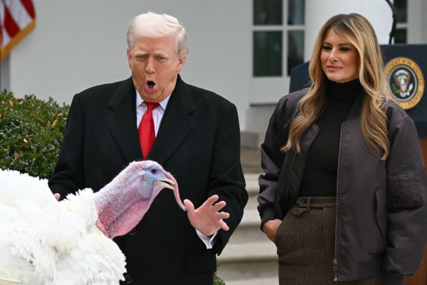 US first lady Melania Trump looks on as US President Donald Trump pardons Gobble the turkey at the White House on Tuesday. Photo: AFP