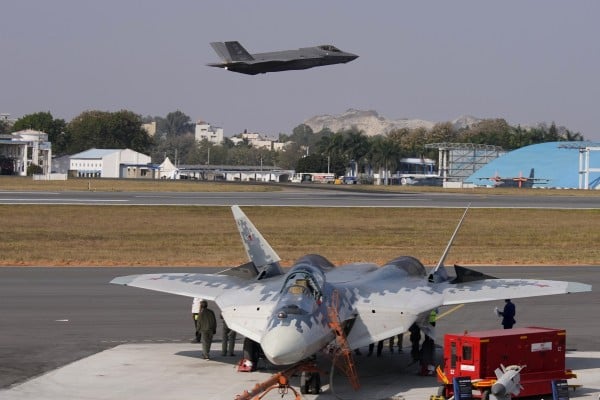 A US F-35 jet flies over Russia’s Su-57 fighter aircraft during an air show at Yelahanka airbase in Bengaluru, India, in February. Photo: AP A US F-35 jet flies over Russia’s Su-57 fighter aircraft during an air show at Yelahanka airbase in Bengaluru, India, in February. Photo: AP