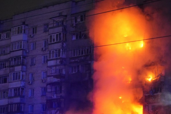 A fire burns at a residential building after a Russian attack in Vyshgorod, outside of Kyiv early on Sunday. Photo: AP A fire burns at a residential building after a Russian attack in Vyshgorod, outside of Kyiv early on Sunday. Photo: AP