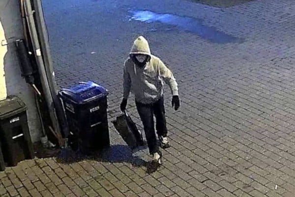 This image from an FBI poster seeking the suspect. Photo: FBI via AP This image from an FBI poster seeking the suspect. Photo: FBI via AP