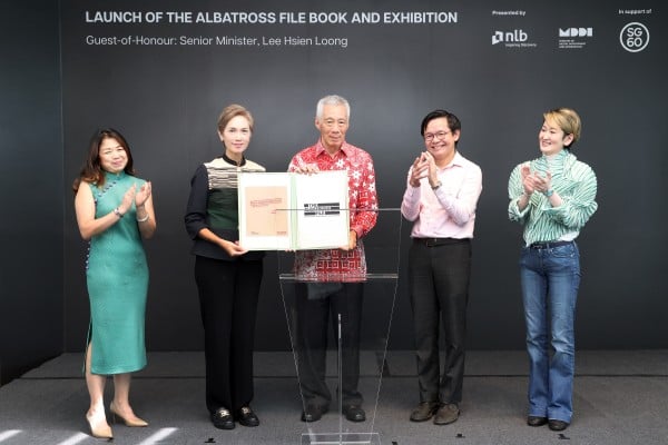 Singapore’s former prime minister Lee Hsien Loong (centre) launches “The Albatross File: Inside Separation” book on Sunday. Photo: Ministry of Digital Development and Information Singapore’s former prime minister Lee Hsien Loong (centre) launches “The Albatross File: Inside Separation” book on Sunday. Photo: Ministry of Digital Development and Information