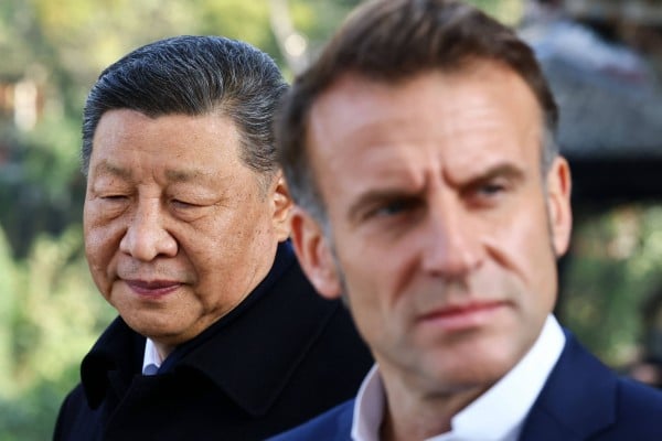 President Xi Jinping and French President Emmanuel Macron are seen here at a Unesco World Heritage site in Dujiangyan, Sichuan province, on Friday. Photo: AFP President Xi Jinping and French President Emmanuel Macron are seen here at a Unesco World Heritage site in Dujiangyan, Sichuan province, on Friday. Photo: AFP