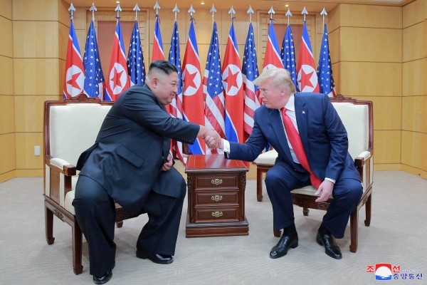 US President Donald Trump with North Korean leader Kim Jong-un at the demilitarised zone separating the two Koreas in Panmunjom on June 30, 2019. Photo: Reuters