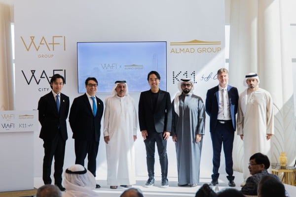 Sheikh Mana bin Khalifa Al Maktoum (third from left) and Adrian Cheng (centre), pictured at a signing ceremony on Wednesday in Dubai. Photo: Handout Sheikh Mana bin Khalifa Al Maktoum (third from left) and Adrian Cheng (centre), pictured at a signing ceremony on Wednesday in Dubai. Photo: Handout