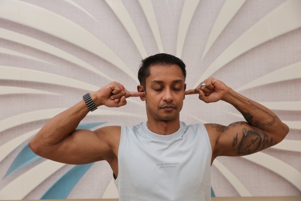 Yoga instructor Samrat Dasgupta demonstrates Bhramari pranayama – or humming bee breath – at the Prana Yoga studio in Hong Kong. Photo: Edmond So Yoga instructor Samrat Dasgupta demonstrates Bhramari pranayama – or humming bee breath – at the Prana Yoga studio in Hong Kong. Photo: Edmond So