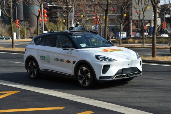 The Baidu-BAIC Arcfox robotaxi is seen on the road. Photo: Shutterstock Images The Baidu-BAIC Arcfox robotaxi is seen on the road. Photo: Shutterstock Images