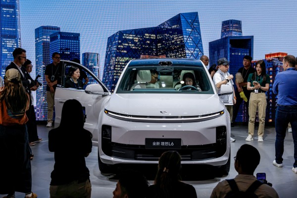 A Li Auto vehicle draws crowds at the Beijing International Automotive Exhibition, April 25, 2024. Photo: Reuters